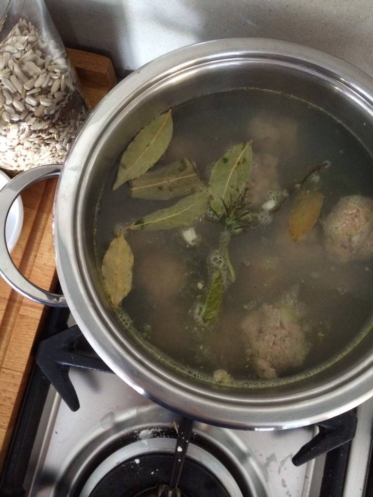 simmering meatballs